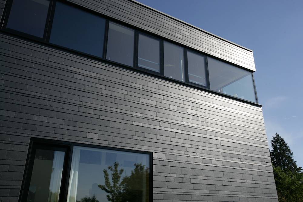 dynamische-deckung-fassade-schiefer-rathscheck-flachdach-1